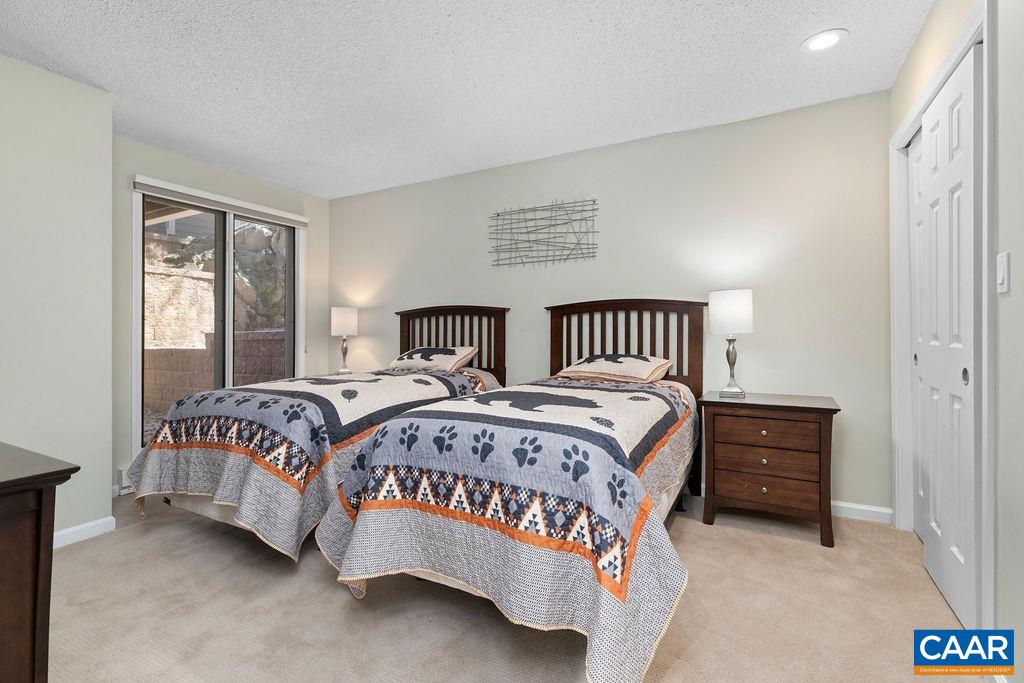 2070 Stone Ridge Wintergreen, VA 22967 - Photo 26 of 52 a bedroom with a bed and window