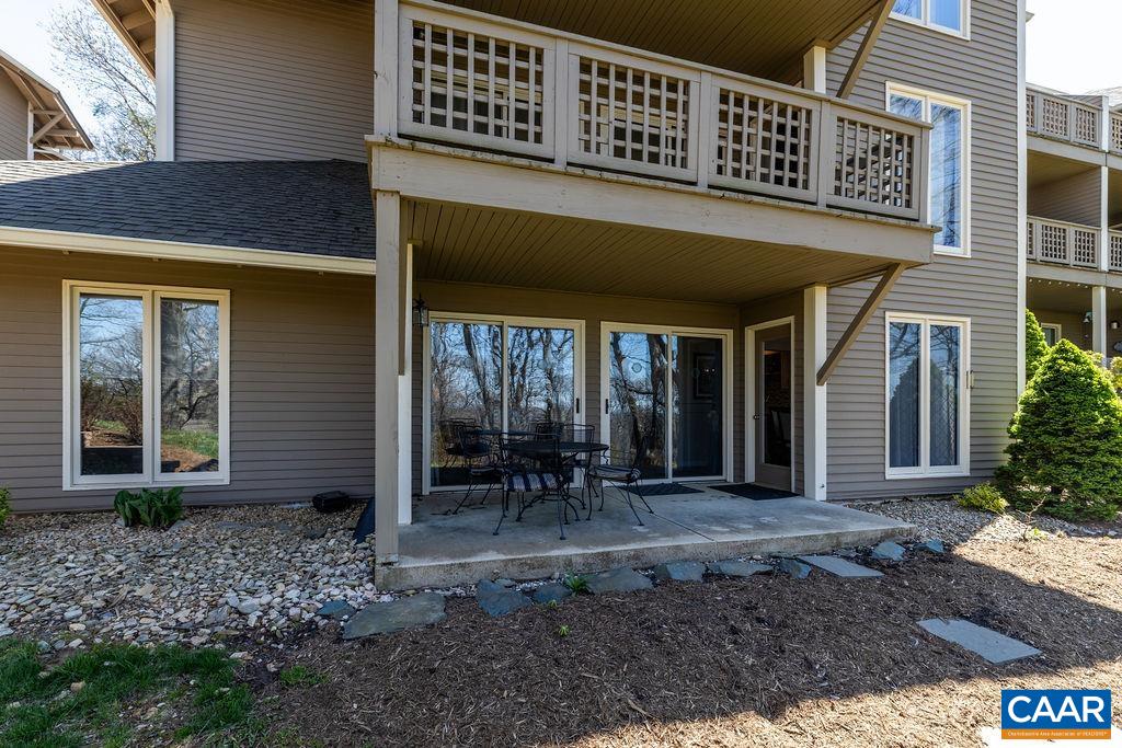 2070 Stone Ridge Wintergreen, VA 22967 - Photo 35 of 52 a backyard of a house with outdoor seating