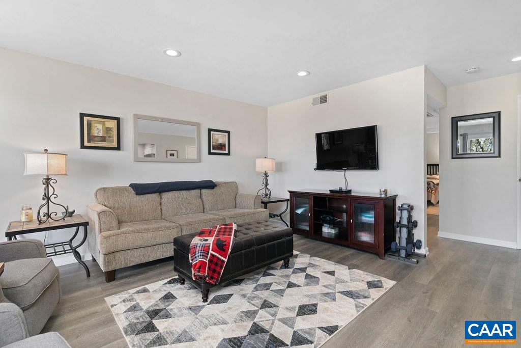 2070 Stone Ridge Wintergreen, VA 22967 - Photo 8 of 52 a living room with furniture and a flat screen tv