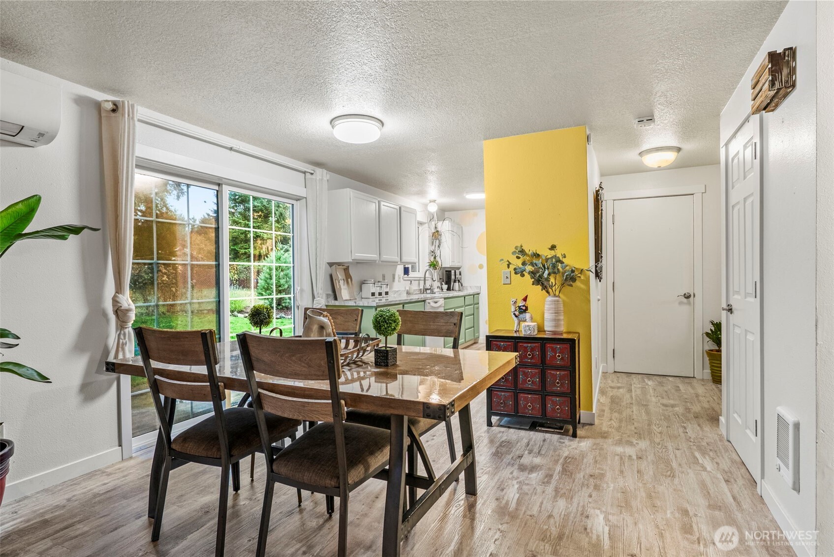 324 Cedar Court Winlock, WA 98596 - Photo 11 of 25 a view of a dining room with furniture and a window