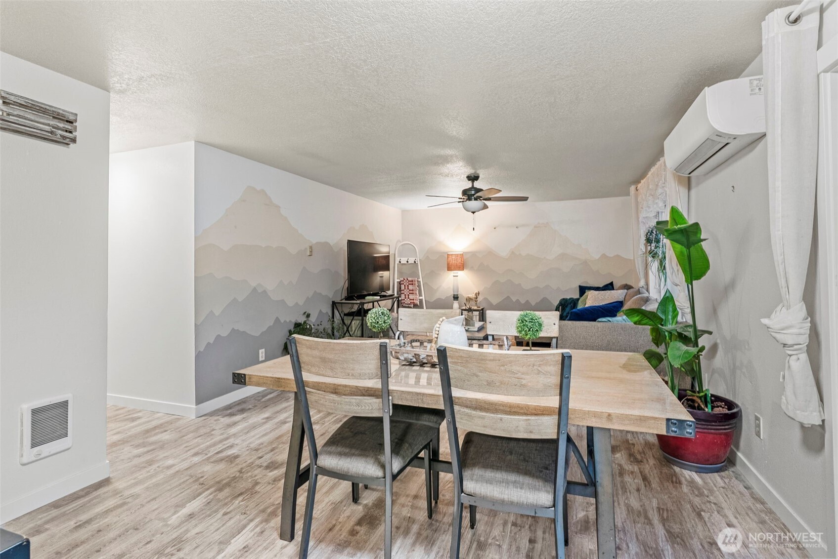 324 Cedar Court Winlock, WA 98596 - Photo 14 of 25 a view of a dining room with furniture and wooden floor