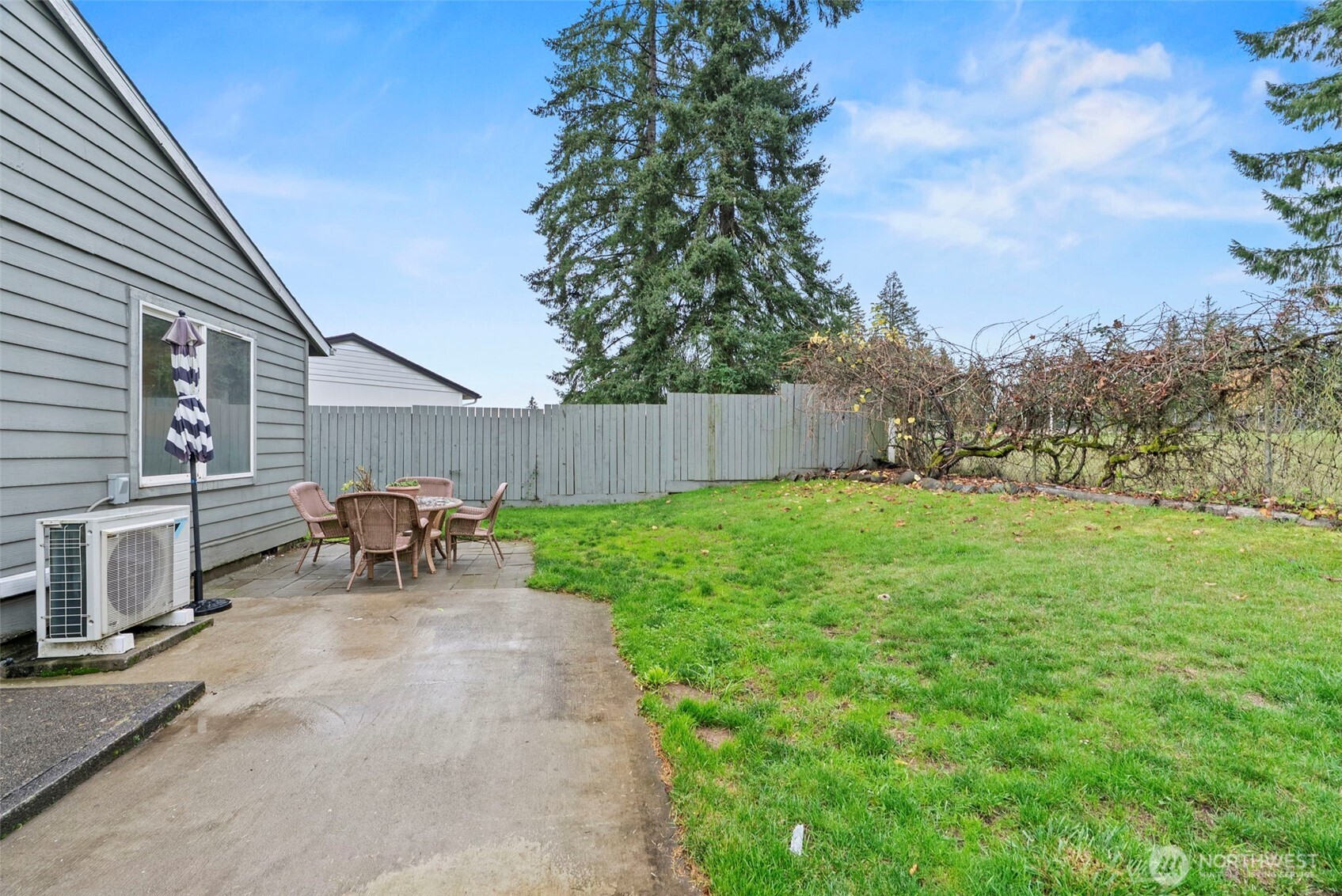 324 Cedar Court Winlock, WA 98596 - Photo 24 of 25 a view of backyard with outdoor seating and green space