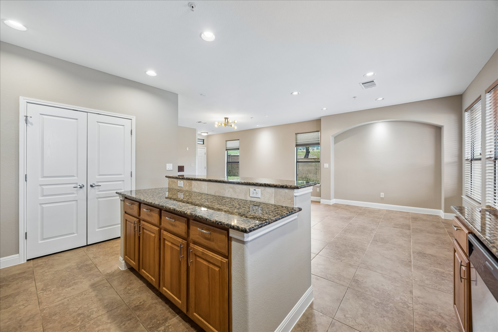 6705 Covered Bridge Drive, Unit 24 Austin, TX 78736 - Photo 12 of 31 a view of kitchen island