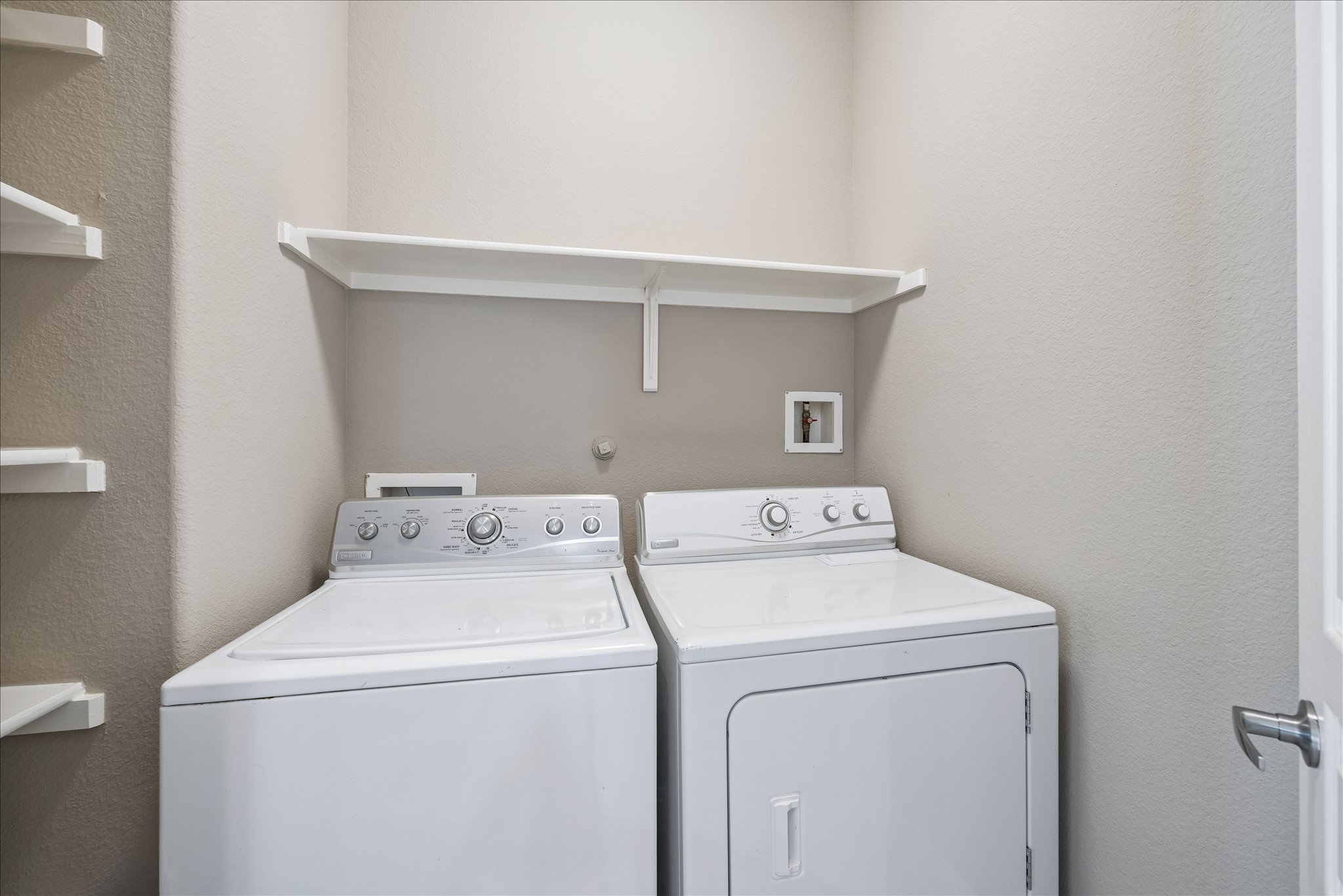 6705 Covered Bridge Drive, Unit 24 Austin, TX 78736 - Photo 26 of 31 a utility room with dryer and washer