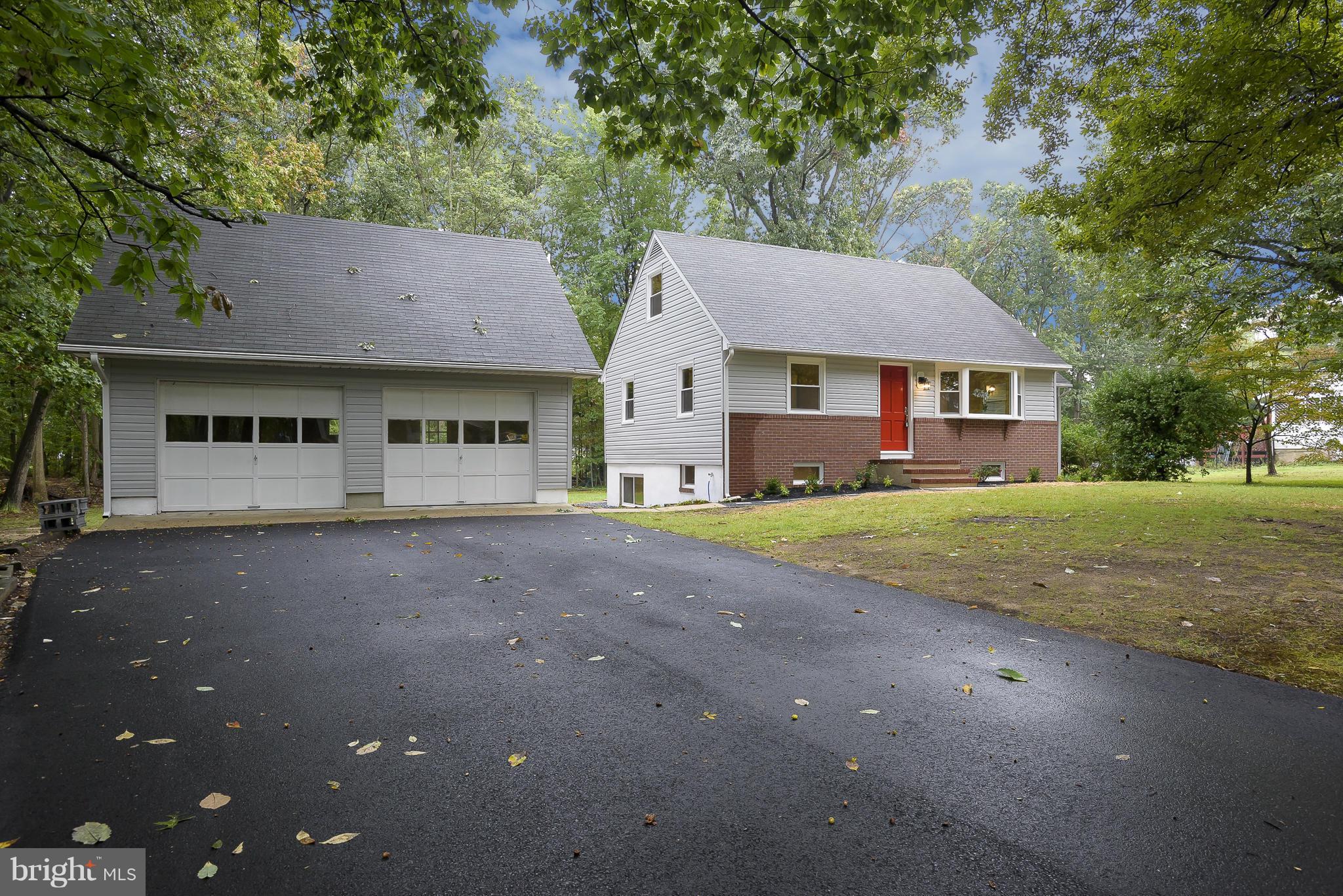 a view of a house with a street