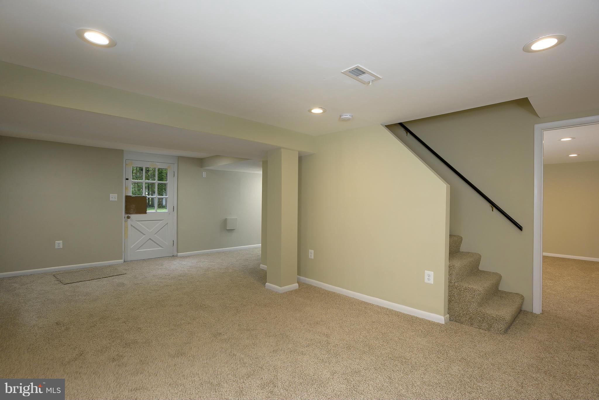 8413 Garland Road Pasadena, MD 21122 - Photo 22 of 30 an empty room with windows