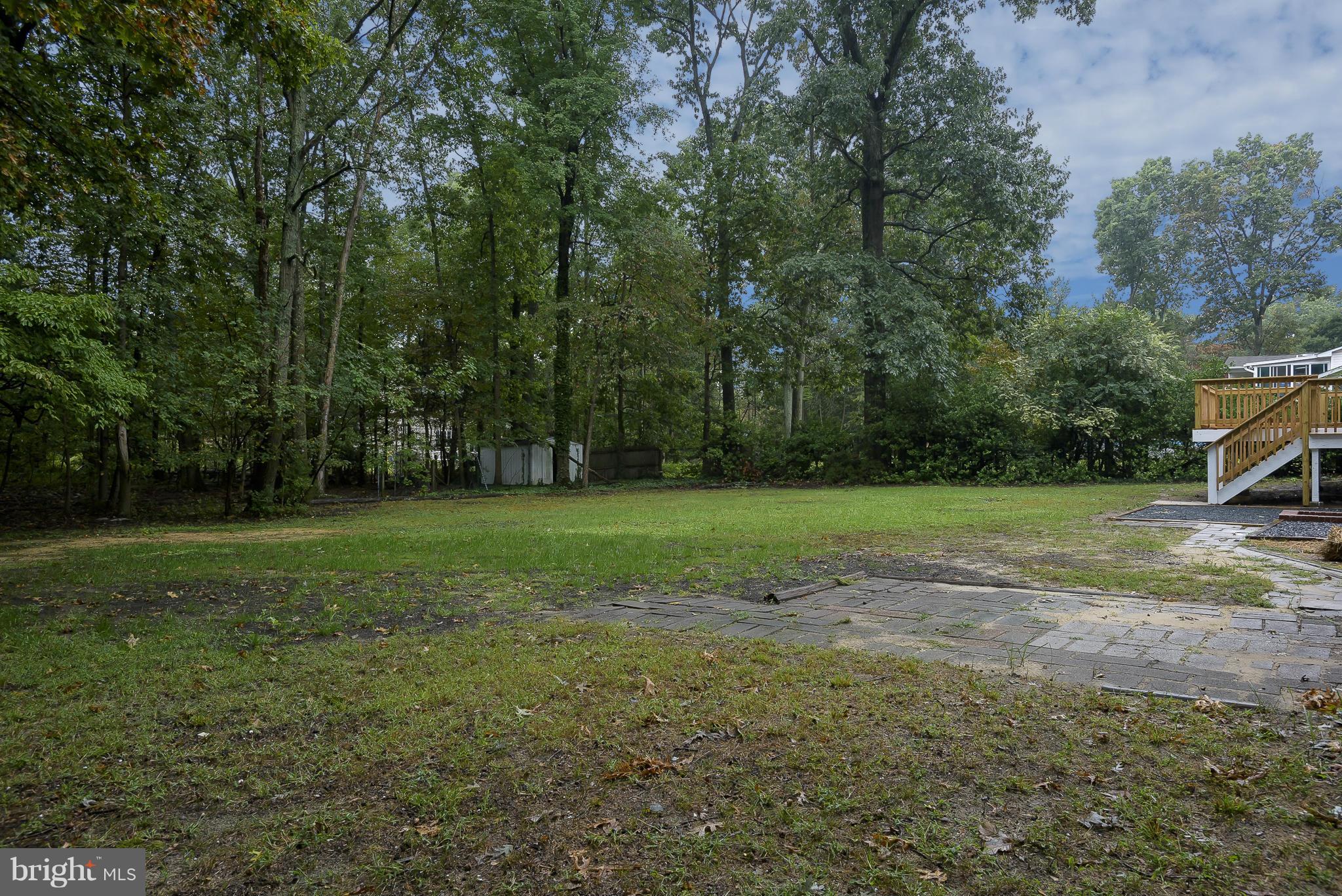 8413 Garland Road Pasadena, MD 21122 - Photo 30 of 30 a view of a yard with a trees