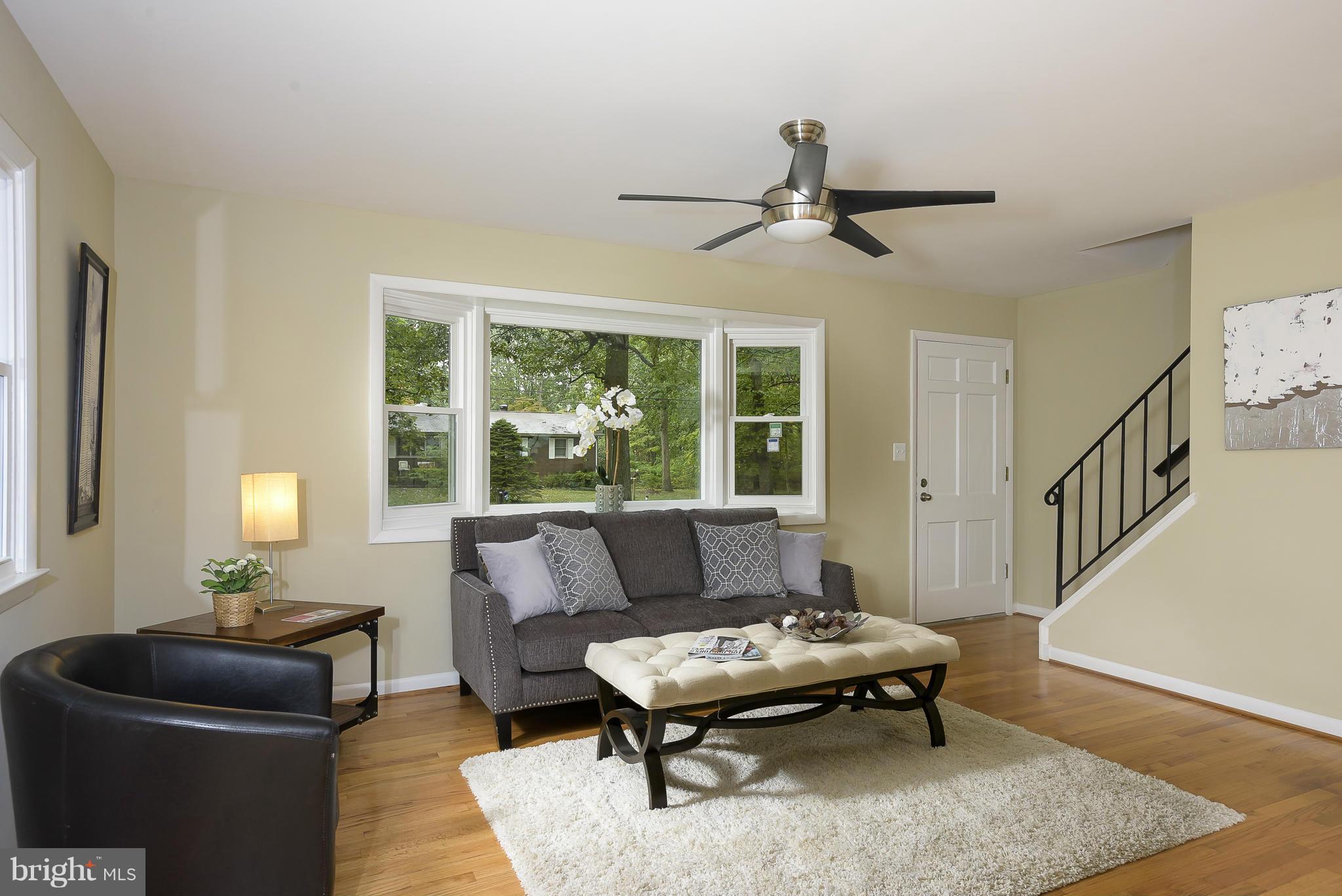 8413 Garland Road Pasadena, MD 21122 - Photo 6 of 30 a living room with furniture and a window