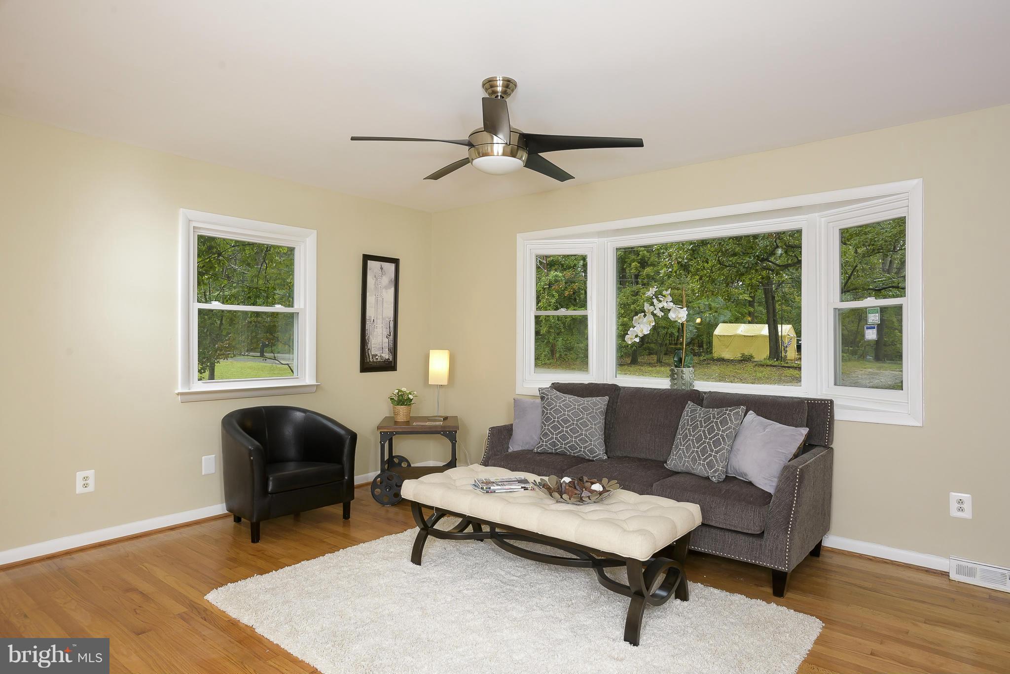 8413 Garland Road Pasadena, MD 21122 - Photo 7 of 30 a living room with furniture and a window