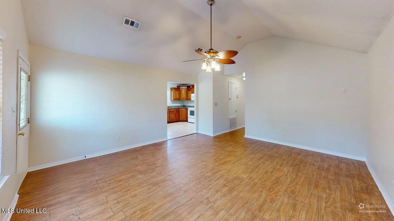 15505 Prairie Street Biloxi, MS 39532 - Photo 5 of 19 15505-Living-Room-Defurnished