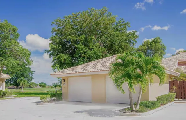 a house view with a garden space