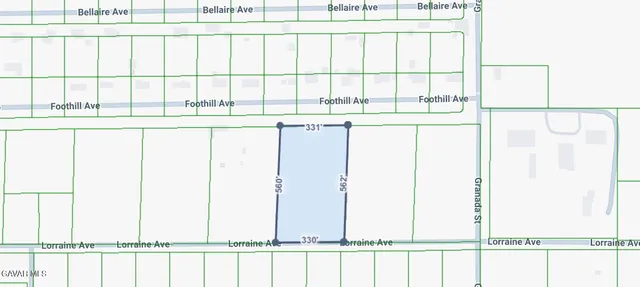 a picture of a room with a window and a white wall