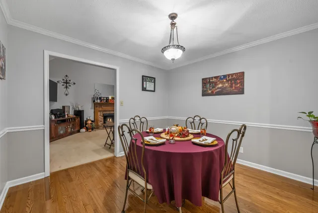 a kitchen with refrigerator and window