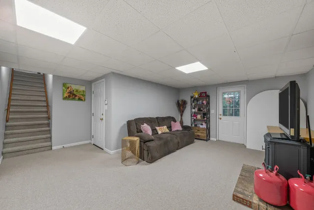 a view of a garden with a building in the background