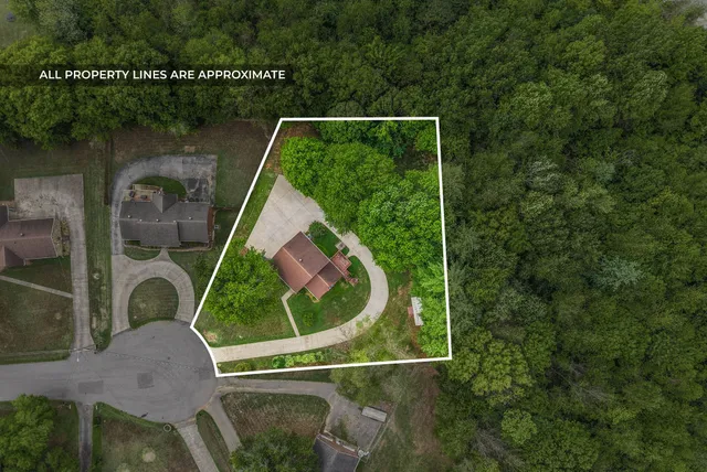 a front view of a house with large windows