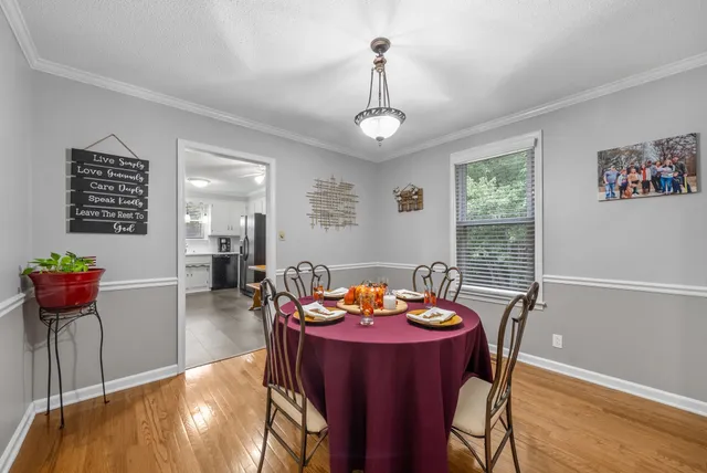a view of a dining room with furniture