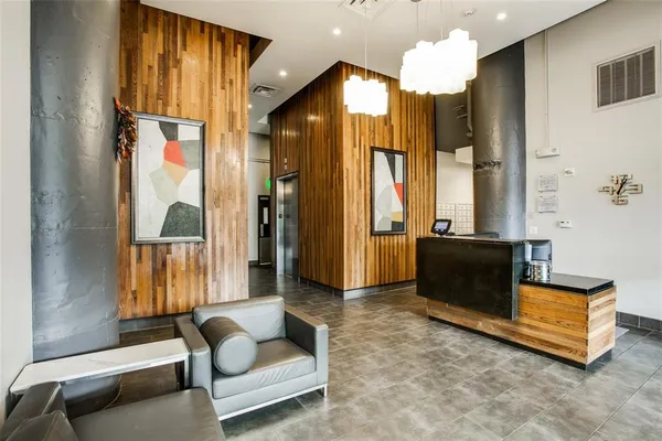 a room with gym equipment and mirrors