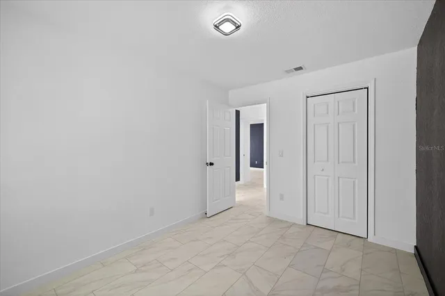 an empty room with a natural light