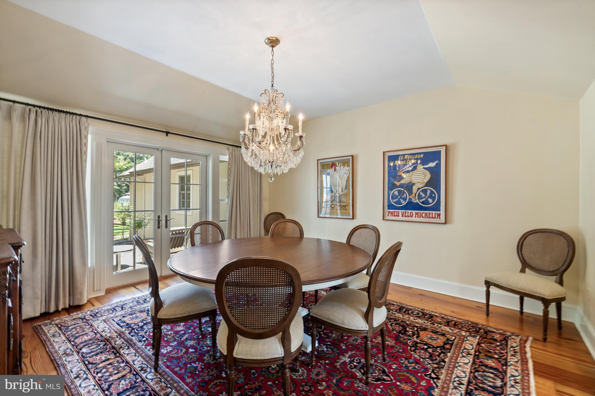 97 Tilthammer Mill Road Boyce, VA 22620 - Photo 11 of 68 a dining room with furniture a rug and a chandelier