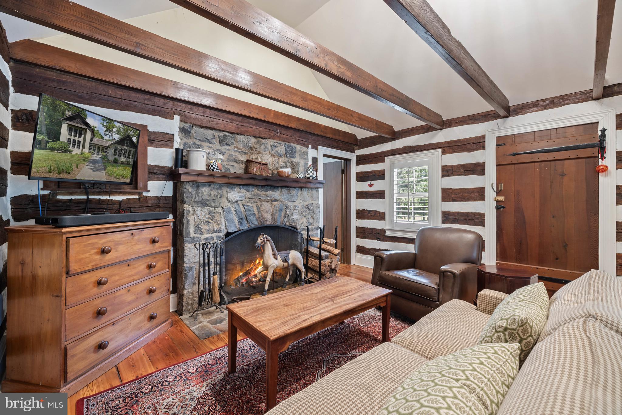 97 Tilthammer Mill Road Boyce, VA 22620 - Photo 15 of 68 a living room with furniture and a fireplace