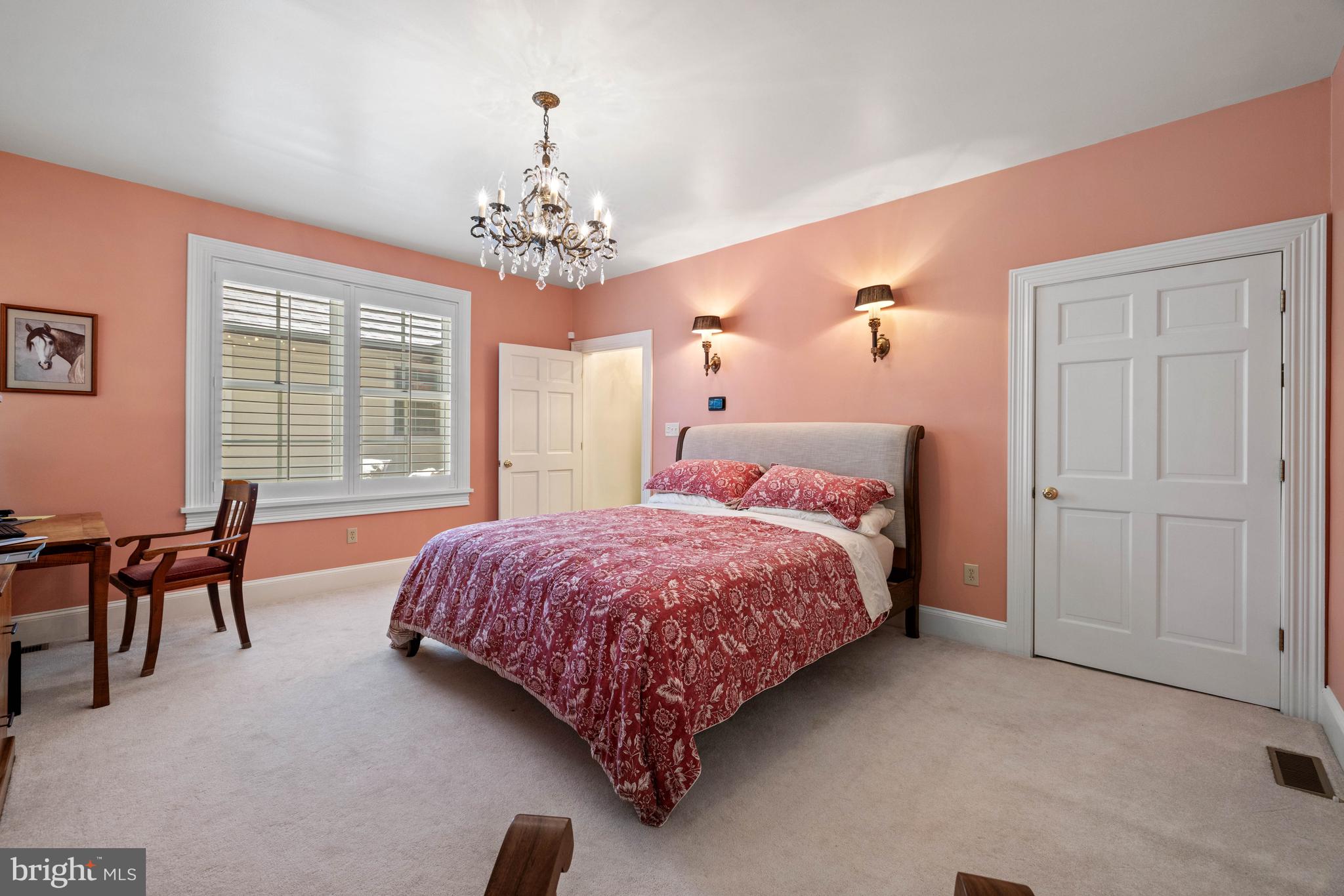 97 Tilthammer Mill Road Boyce, VA 22620 - Photo 26 of 68 a spacious bedroom with a bed and a table chair