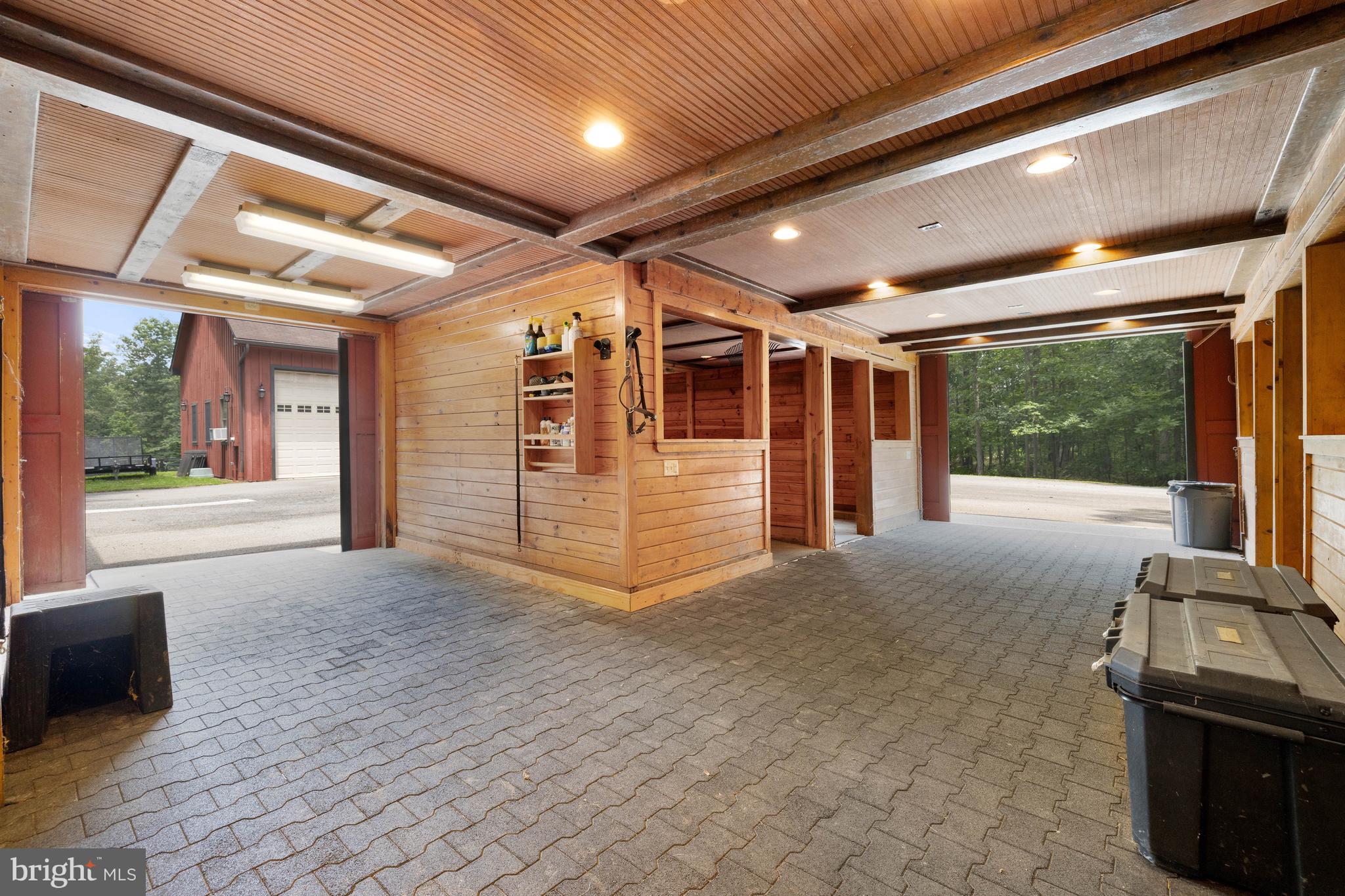 97 Tilthammer Mill Road Boyce, VA 22620 - Photo 44 of 68 a view of an empty room with a fireplace and windows