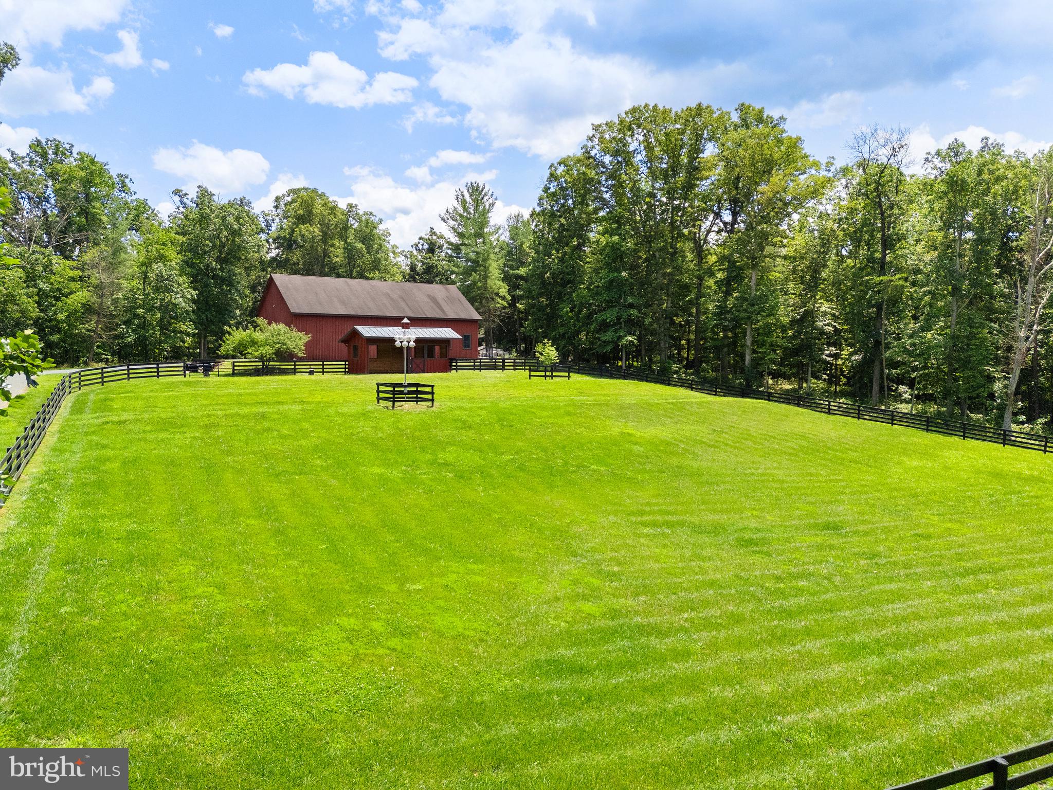 97 Tilthammer Mill Road Boyce, VA 22620 - Photo 59 of 68 a backyard of a house with lots of green space