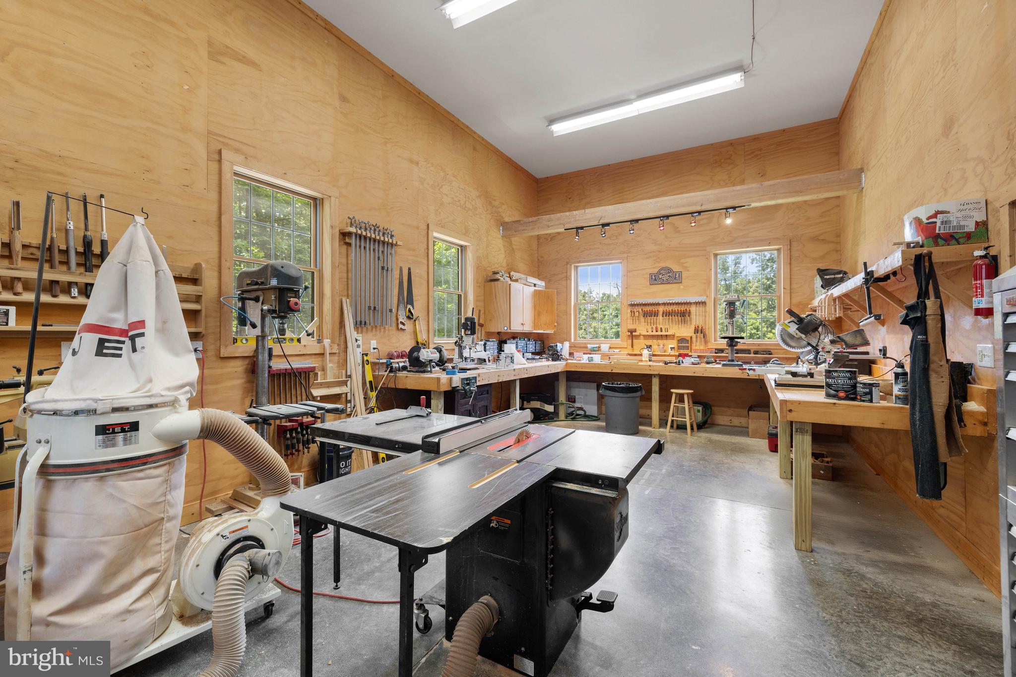 97 Tilthammer Mill Road Boyce, VA 22620 - Photo 62 of 68 a living room with lots of furniture and white walls