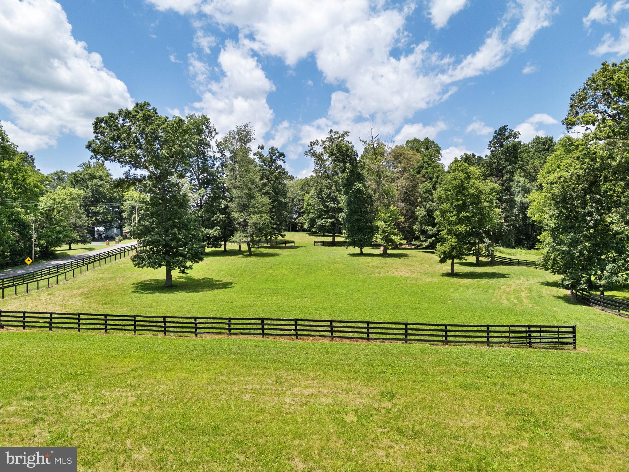 97 Tilthammer Mill Road Boyce, VA 22620 - Photo 63 of 68 a view of a golf course with a lake