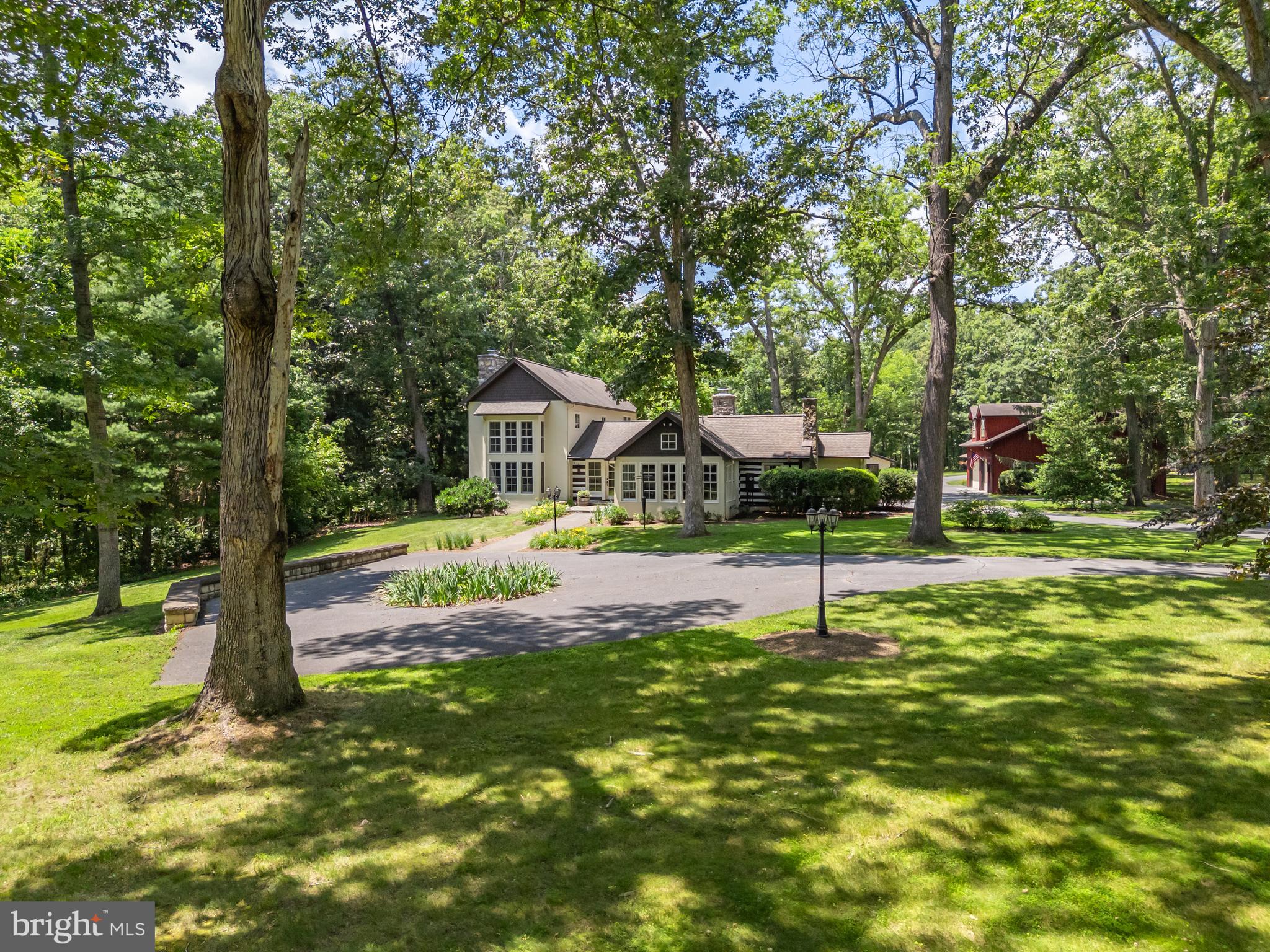 97 Tilthammer Mill Road Boyce, VA 22620 - Photo 68 of 68 a view of house with garden and trees