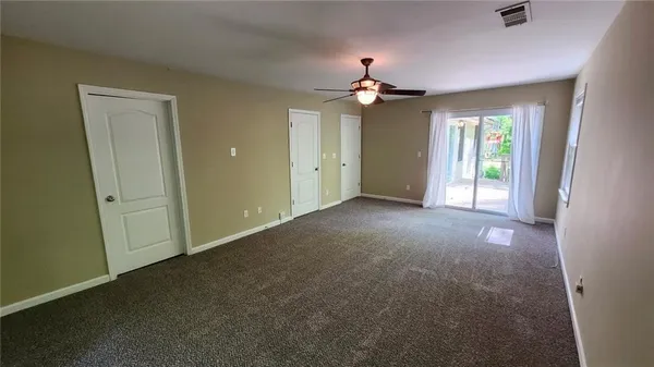 a bathroom with a bathtub sink and mirror