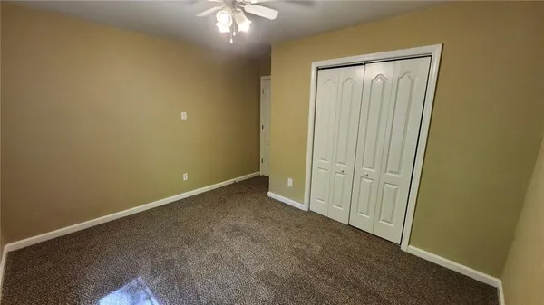 a view of a house with a large window