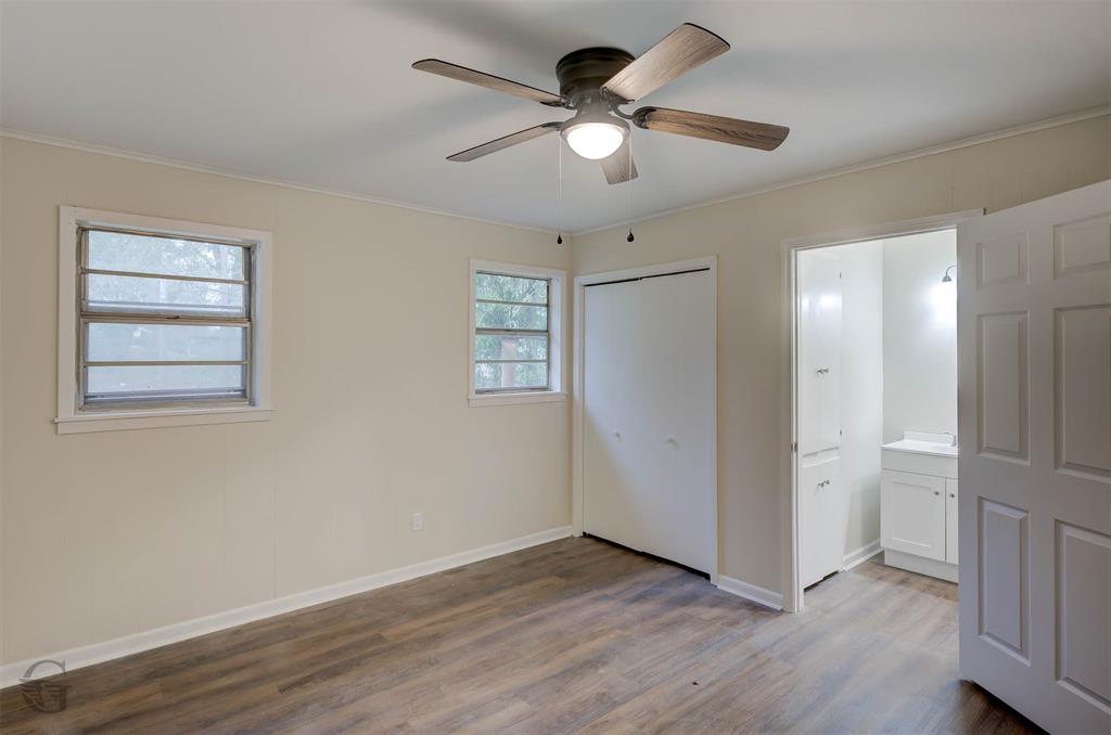 109 Milton Drive Minden, LA 71055 - Photo 13 of 24 a view of an empty room with wooden floor