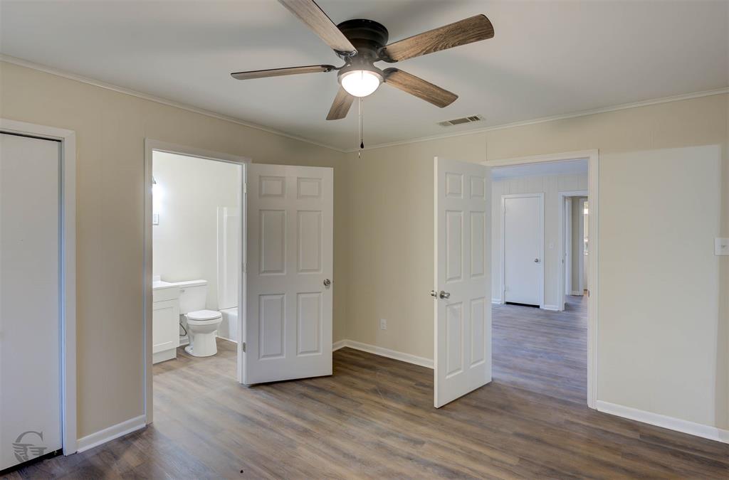 109 Milton Drive Minden, LA 71055 - Photo 14 of 24 a view of an empty room and wooden floor