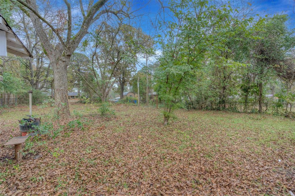 109 Milton Drive Minden, LA 71055 - Photo 23 of 24 a view of a forest with trees in the background
