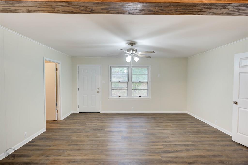 109 Milton Drive Minden, LA 71055 - Photo 6 of 24 wooden floor in an empty room with a window