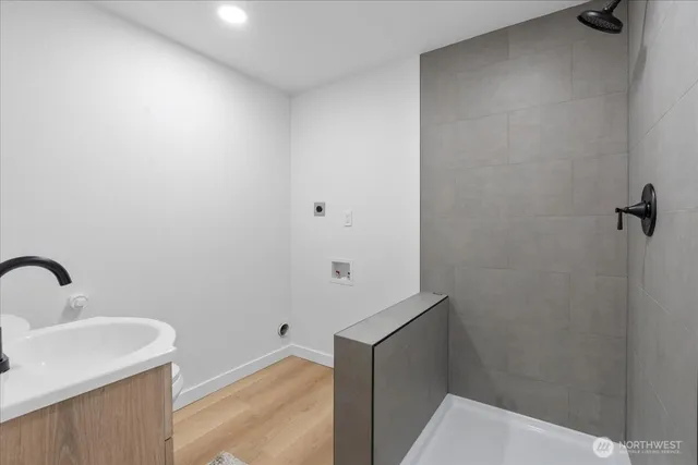 a bathroom with a sink and mirror