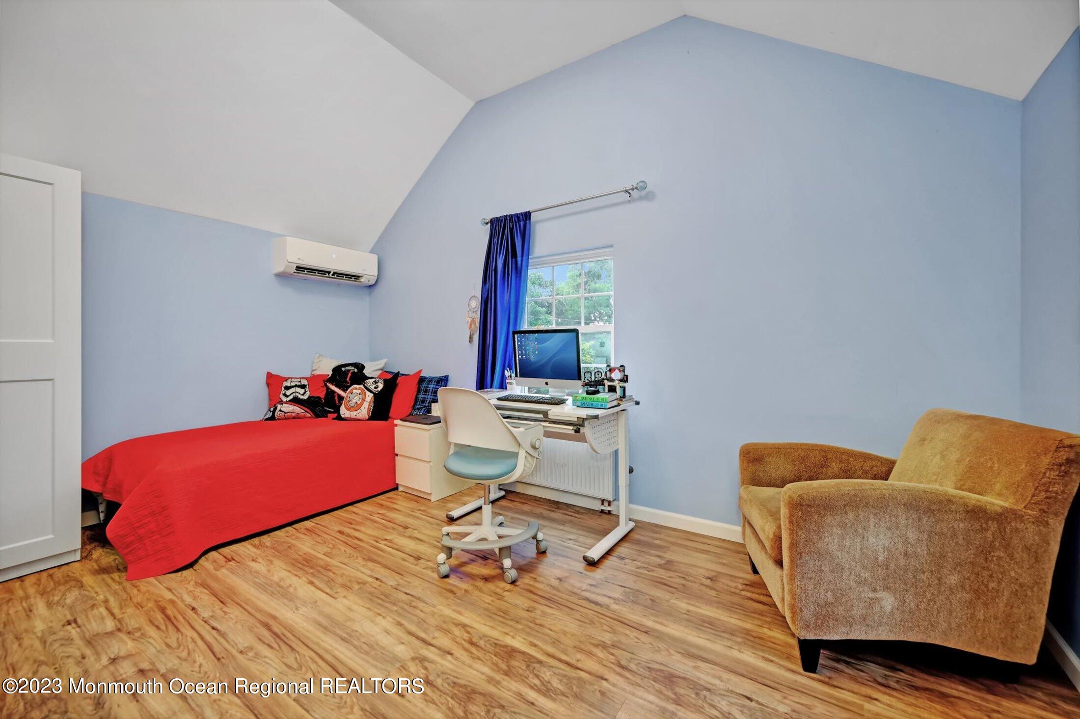 33 Conover Road Colts Neck, NJ 07722 - Photo 19 of 35 a bedroom with furniture and a window