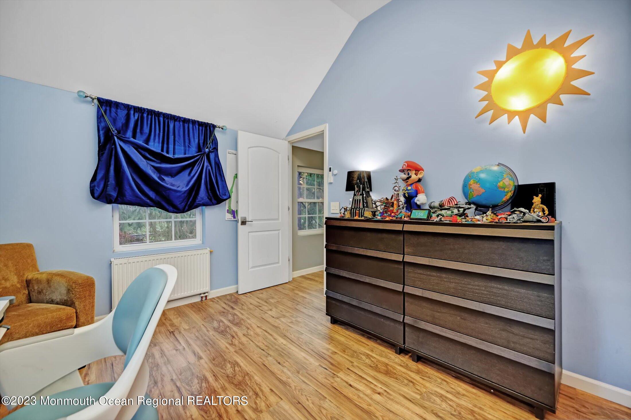 33 Conover Road Colts Neck, NJ 07722 - Photo 20 of 35 a bedroom with furniture and a bed