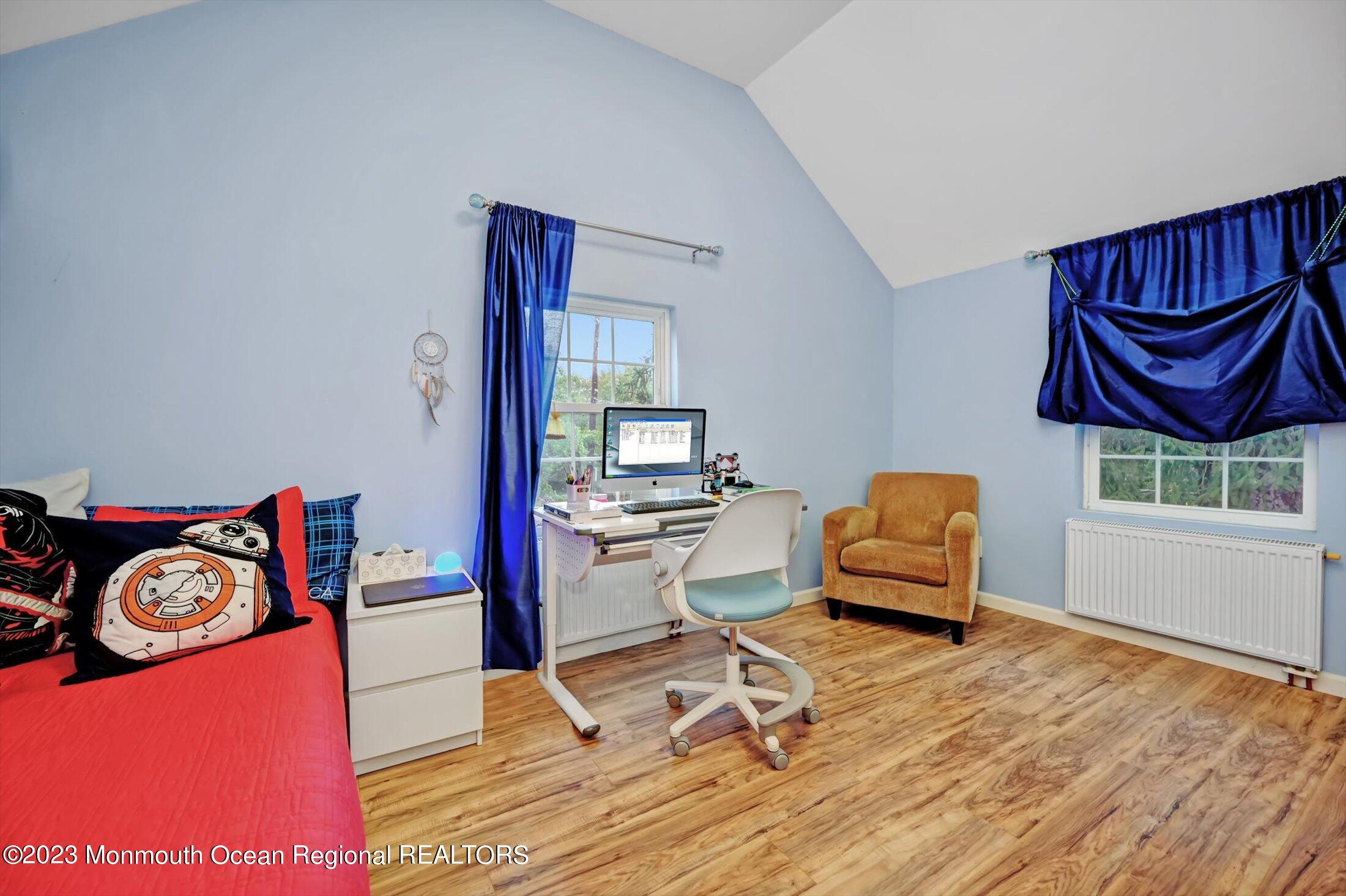 33 Conover Road Colts Neck, NJ 07722 - Photo 21 of 35 a living room with furniture and a wooden floor