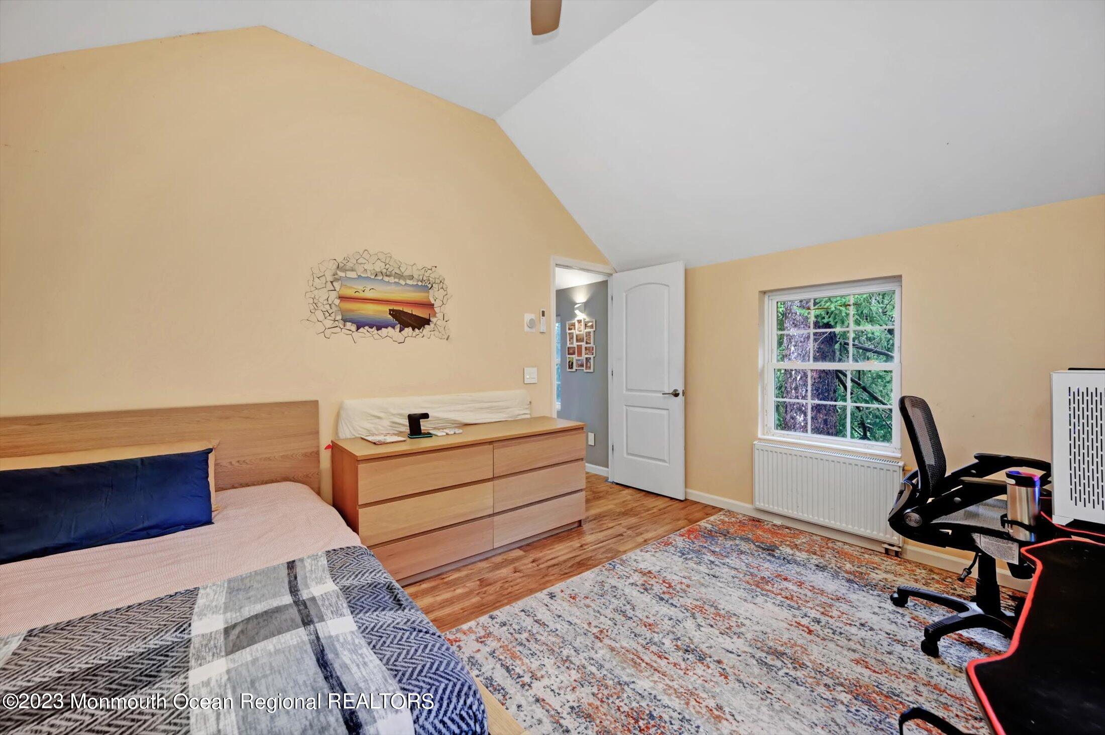 33 Conover Road Colts Neck, NJ 07722 - Photo 23 of 35 a room with furniture and a window