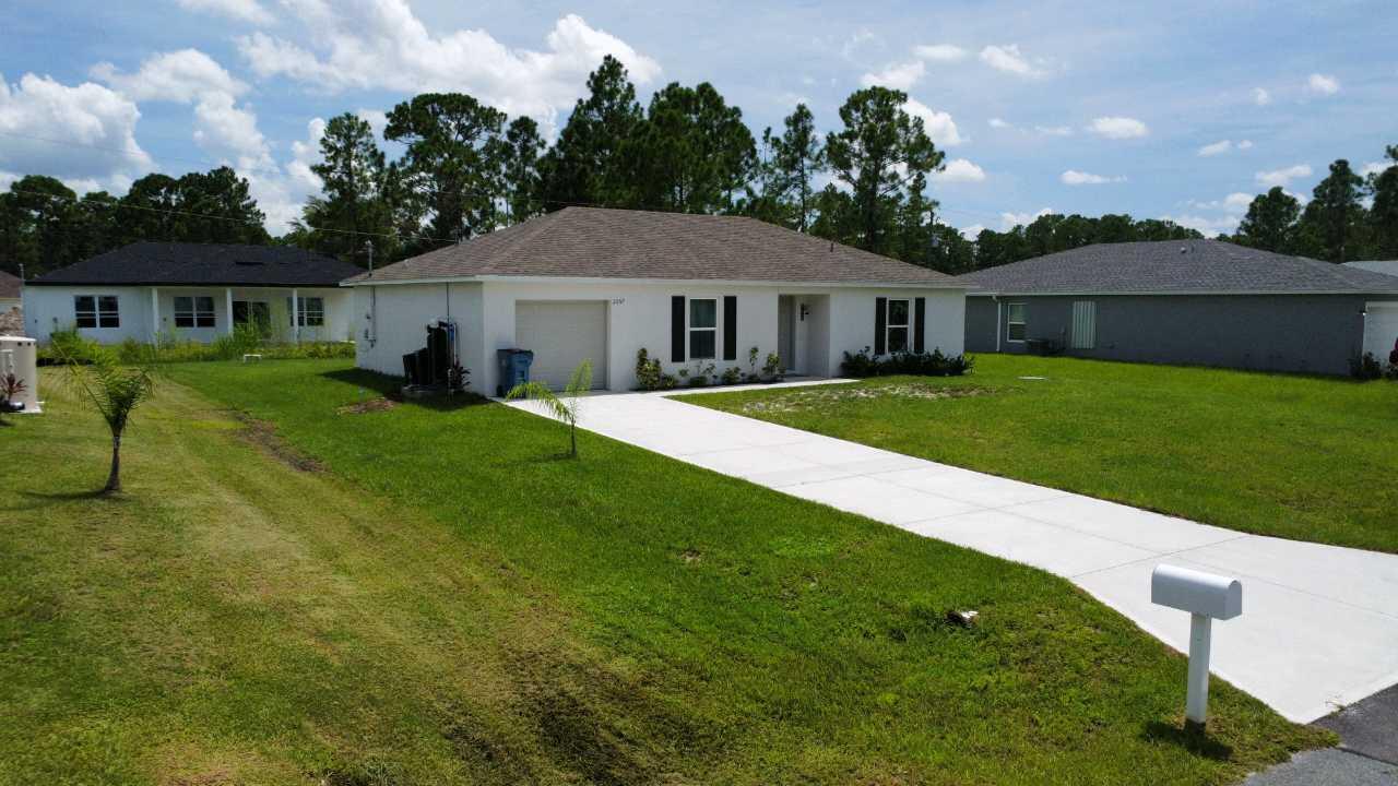 2657 Foster Road Southeast Palm Bay, FL 32909 - Photo 2 of 24 dji_fly_20250829_140120_763_175649539632
