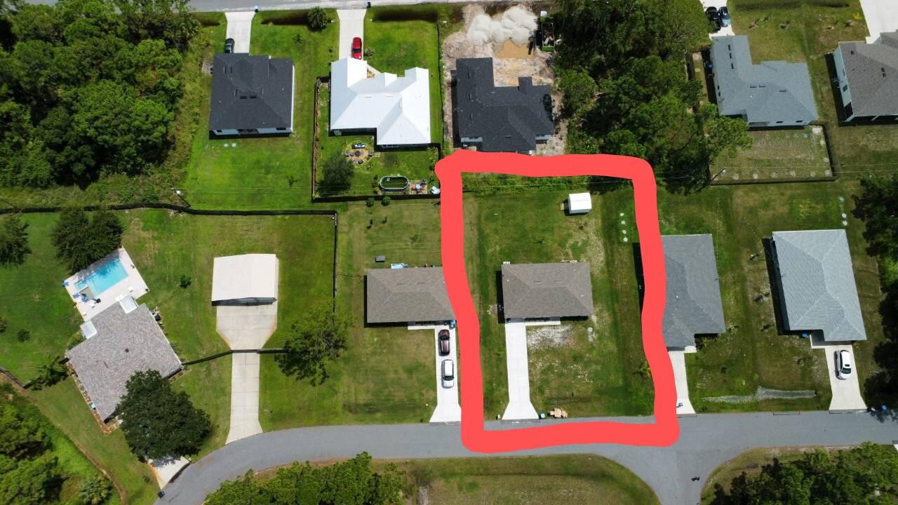 2657 Foster Road Southeast Palm Bay, FL 32909 - Photo 22 of 24 dji_fly_20250829_140012_760_175649539823