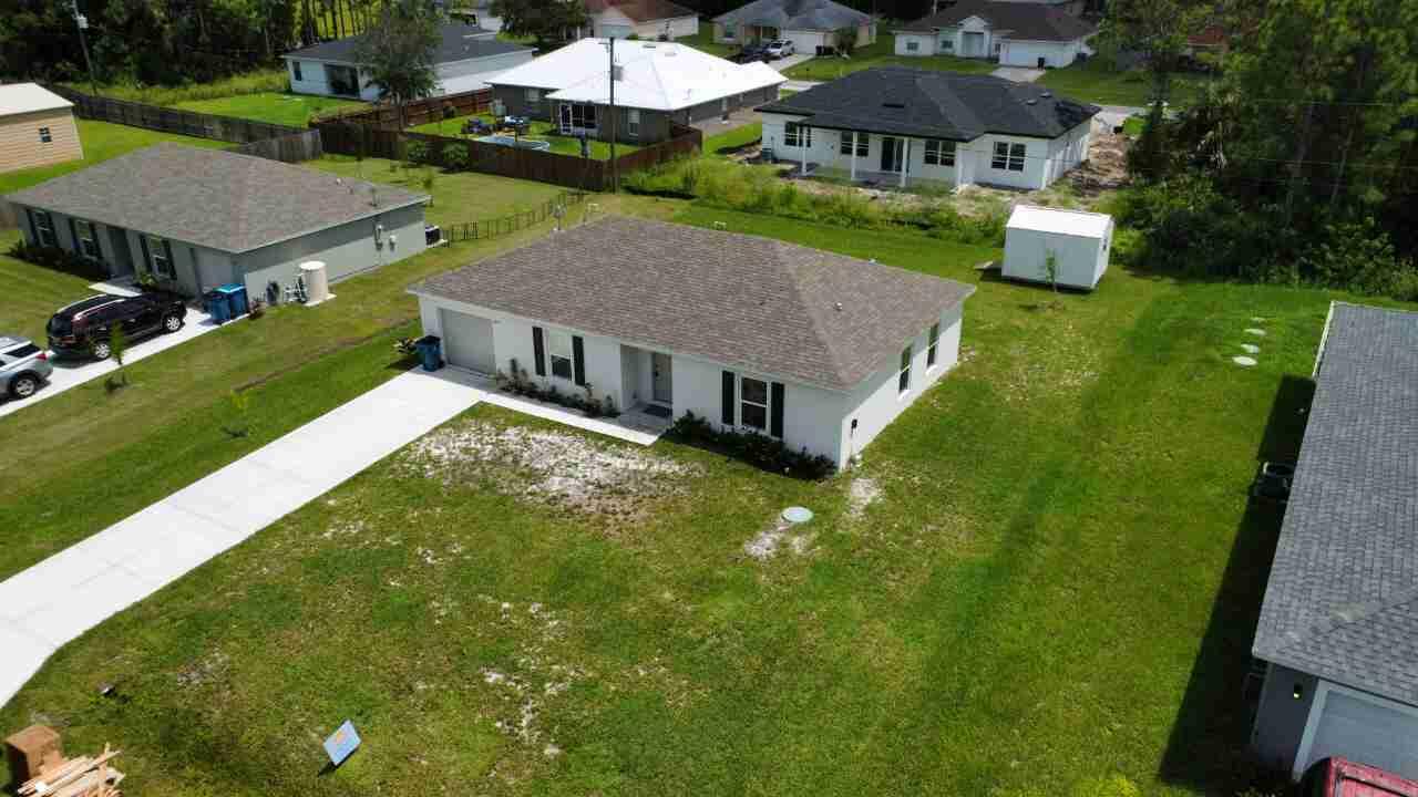 2657 Foster Road Southeast Palm Bay, FL 32909 - Photo 3 of 24 dji_fly_20250829_135712_744_175649540452