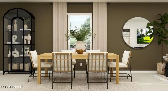 a view of a dining room with furniture and a window