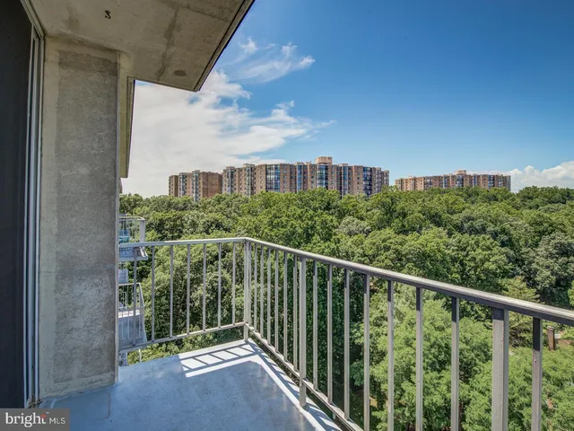 a balcony with an outdoor space