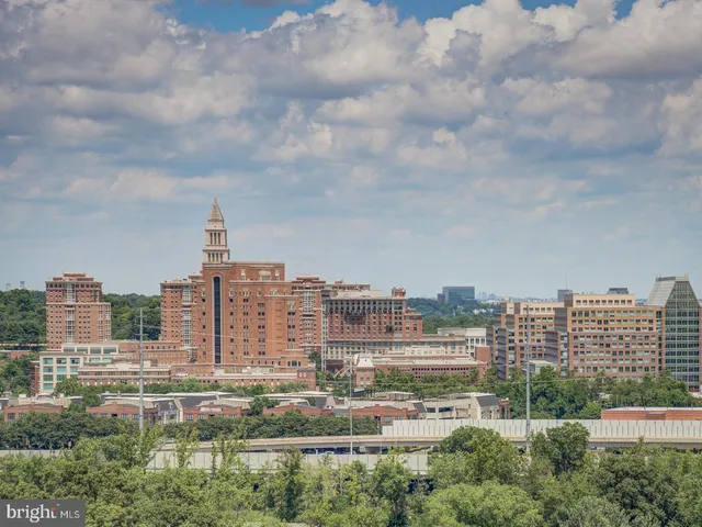 a view of a city with tall buildings in the background