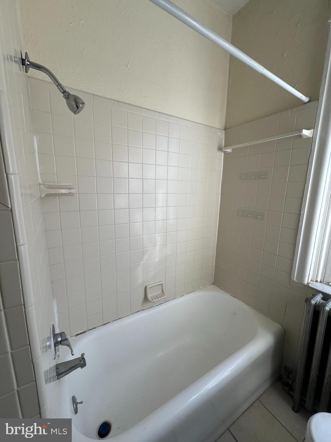 213 East Main Street Maple Shade, NJ 08052 - Photo 11 of 21 a bathroom with a tub and a shower