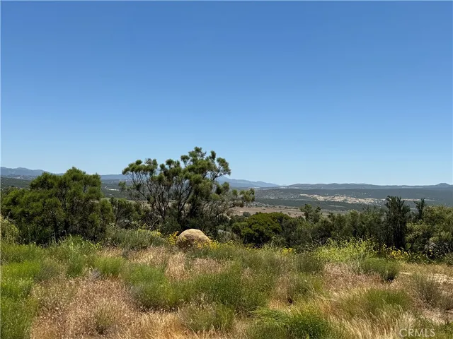 a view of a lake with mountains in the background