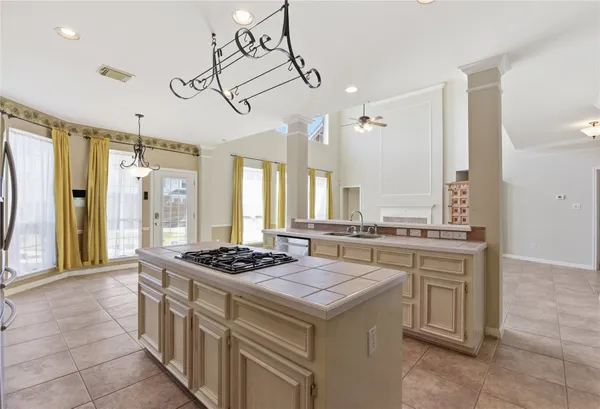 a view of a hallway with a chandelier